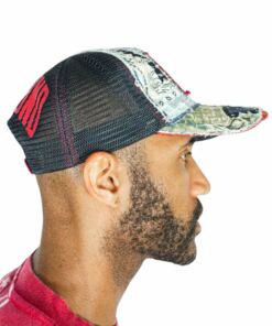 Side profile of a man wearing a colorful mesh cap.