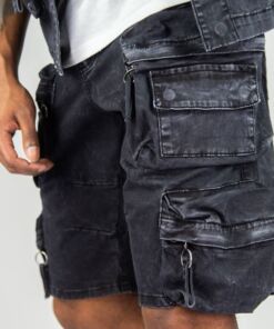 Black cargo shorts with multiple zippered and buttoned pockets.