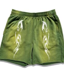 Green shorts with white tribal designs on the front.