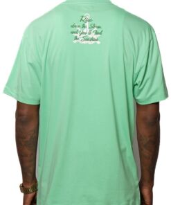 Person wearing a mint green T-shirt with text on the upper back.